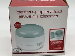 Battery operated Jewely cleaner. Fill cleaner with water or cleaner and let the ultrasonic waves bubble the dirt away.