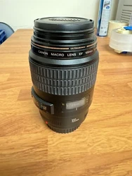 Canon EF 100mm f/2.8 Macro USM Lens. Tested and works as normal.