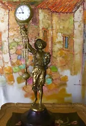 Antique Clock German Mantel Brass Boy w/Onions Clock. This is a very beautiful Mantel clock that can be put on display...