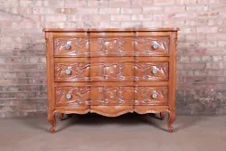 A gorgeous French Provincial Louis XV style carved oak dresser chest. By Henredon Furniture 