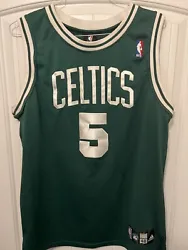 Own a piece of basketball history with this authentic Kevin Garnett Boston Celtics jersey. Show your support for the...