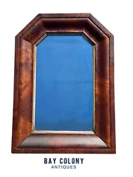 19TH CENTURY ANTIQUE MAHOGANY EMPIRE OGEE MIRROR. There are two tiny shrinkage splits on the left side of the mirror...