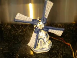 Real cool from a estate in Chattem Cape cod Mass a antique windmill fantastic lamp the little windows light up real...