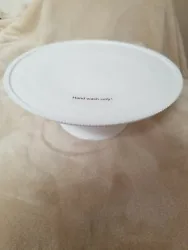 White Milk Glass short cake stand. I also researched them on Amazon and a reviewer also noted that they had this...