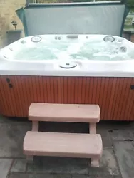 Jacuzzi J345 Hot Tub w/waterfall feature and color changing LED lighting. 36