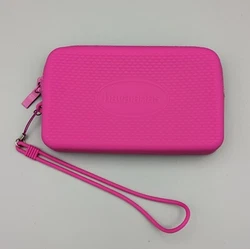 You are looking at a pre-owned Havaianas Pink Silicone Zippered Wallet Case Wristlet with Strap. Unless its on the...