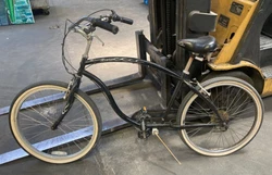 Chain is loose. Tires are flat. Has wear and surface blemishes.