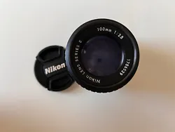 Nikon series E 100mm 1:2.8 lense. Condition is Used. Shipped with USPS Priority Mail.