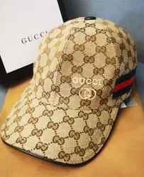 Brown GG logo signature fabric upper. Color: brown.