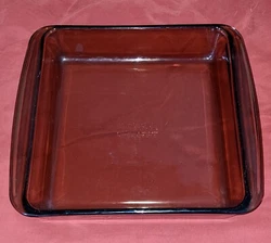 Pyrex 222 Baking dish light brown, scratches on bottom.