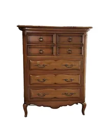 You can see the dowel details on the top. The mirror has an amazing cut-out detail on the top. Triple dresser L63
