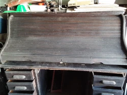 Desk could use restoration . Never been refinished.