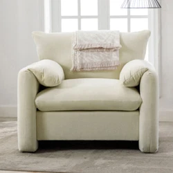 Sink into pillowy plush comfort with the Chenille Armchair. [Modern design] Clean lines and contoured arches add style...