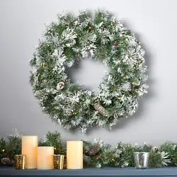 MIXED NEEDLES: From its glitter frosted needles to its snow powdered pine cones, our wreath perfectly captures the...
