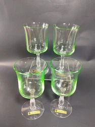 Ideal for wine enthusiasts and collectors, this set of four glasses is a rare find and perfect for displaying or using....
