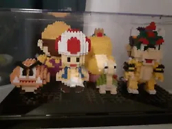 Collection 7 figurines Super Mario en briques. Superbes.