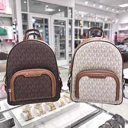 Zip around top closure, flat top handle, adjustable shoulder. fabric lining, logo details. COLOR: Brown. Light Cream.