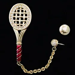 Retired - Signed Swan Swarovski - Gold Plated - Tennis Racquet outlined with clear crystals - a red guilloche’ handle...