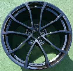 ORIGINAL Factory Chevrolet Corvette Grand Sport Wheel. This one is for the rear of the vehicle. Color is gloss (shiny)...