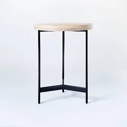 •Round end table easily fits next to an armchair or a sofa •Black metal frame creates an elegant look •Brown...