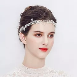 Stunning headpiece has rhinestones, crystals, pearls and beads with floral design in hand wired vine. Dont forget to...