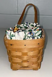 This Longaberger small basket is perfect for hanging on your wall, adding a touch of charm to any room. The basket...