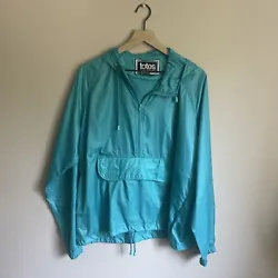 TURQUOISE TOTES WINDBREAKER, WATER RESISTANT, NYLON PONCHO, LARGE MEN’S. Pit to pit 25”