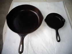 This is a SET OF 2 cast iron skillets, one small Griswold #3, and one large, unbranded skillet with # 10 stamped on...