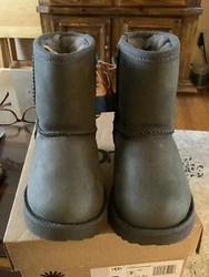 UGG Australia Toddler Classic Boot Size 7 Weather Short ( Gray). Very nice pair of boots , there are a couple of spots...