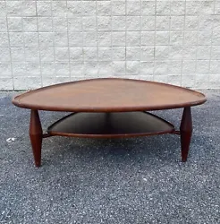 . .Stunning solid walnut two tier parabolic coffee table made by The John Widdicomb Furniture Co. c. 1950’s. Copper...