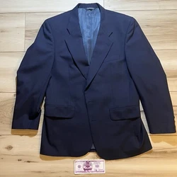 Features padded shoulders, burberry horse logos around inner liner. Very clean condition, very small pinhole at...