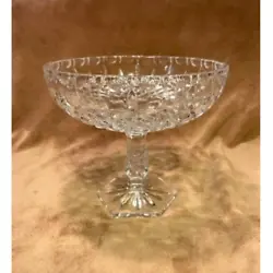Beautifully unique pedestal crystal candy dish features fine cut diamond, oval, scalloped rim design.
