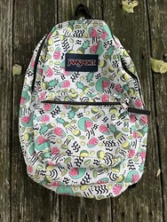 White with colorful sliced tropical fruit print. Good used condition. Was recently washed.