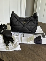 Prada Padded Re-Nylon Shoulder Bag. Brand new. RFID microchip. Retail $2400. Only tried on in the Prada store and taken...