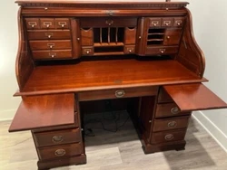 Rare Find! Used Oak roll top desk (54 x 30) with minor blemishes.  Free local pick up only.