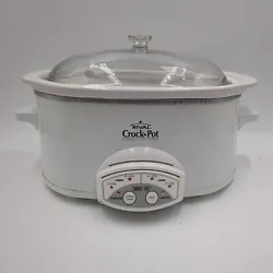 Slow cooker turns on and operates. Slow cooker has scratches, scrapes and marks.