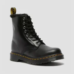 Welted on a rugged AirWair sole and marked with signature yellow stitching, these boots are not designed to blend in....