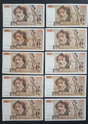 100 FRANCS. LOT DE 10 BILLETS. BILLETS AYANT CIRCULE. Noubliez pas de majouter à votreliste de favoris.