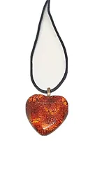 Amber Colored Heart Shaped Pendant Black Corded 16” Necklace. Combined shipping discount on all jewelry only .50...