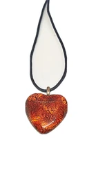 Amber Colored Heart Shaped Pendant Black Corded 16” Necklace. Combined shipping discount on all jewelry only .50...