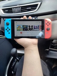 Nintendo Switch 32GB Handheld Console - Neon Red/Neon Blue.