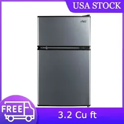 Introducing the Arctic King 3.2 Cu. Feet Two-Door Mini Fridge with Freezer in Stainless Steel - a versatile and compact...