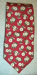 Burberrys silk necktie. White flower print on red. Excellent unused condition.