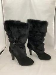 They are dyed rabbit fur. These beautiful boots are mid-calf.