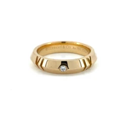 Atlas X Closed Narrow Band Ring. Includes original Tiffany inner/outer box. 18k rose gold (AU750). This ring is in...