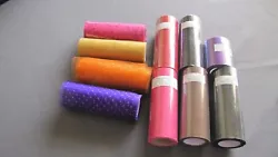This lot consists of 10 rolls of glitter tulle. The yardage on each roll varies between 10 and 12 yards. The purple...