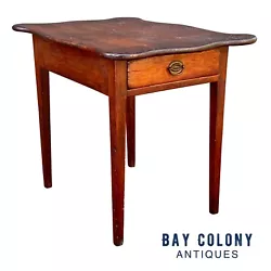 18TH CENTURY ANTIQUE NEW ENGLAND HEPPLEWHITE PINE ONE DRAWER TABLE WITH SCALLOPED TOP. We suspect the table was...