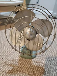 Vintage Electric Metal Fan, Adjustable Oscillating 12”Cage. Cord end has been replaced. Fan powers on and manual...