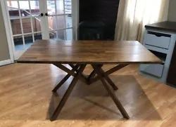 Modern Rustic dining table with spider base.  Handmade by local woodworking artisan.  Solid oak with walnut finish. ...