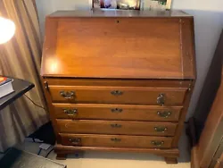 Beautiful maple desk, minus all the paperwork, excellent condition. Four large drawers and multiple cubby holes. Moving...